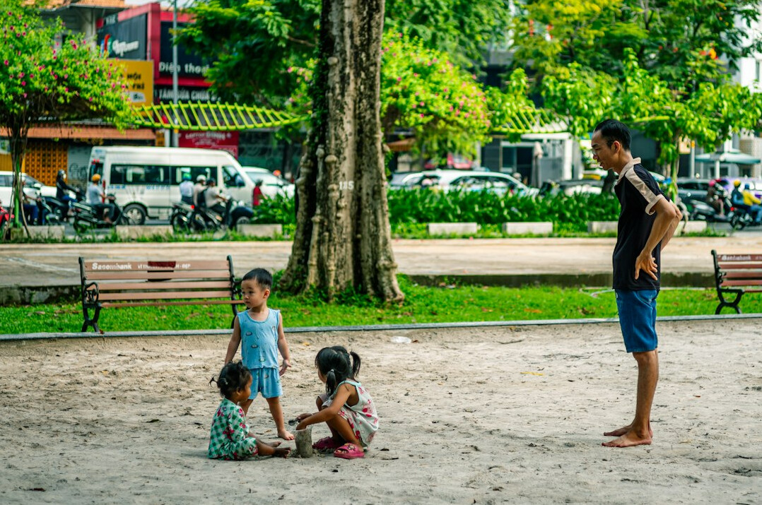 family playing in park