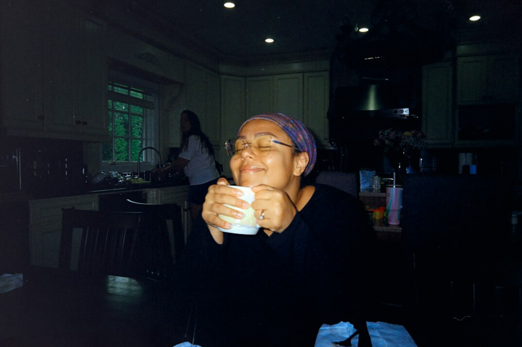 person enjoying morning coffee