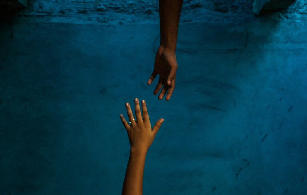 person helping stranger