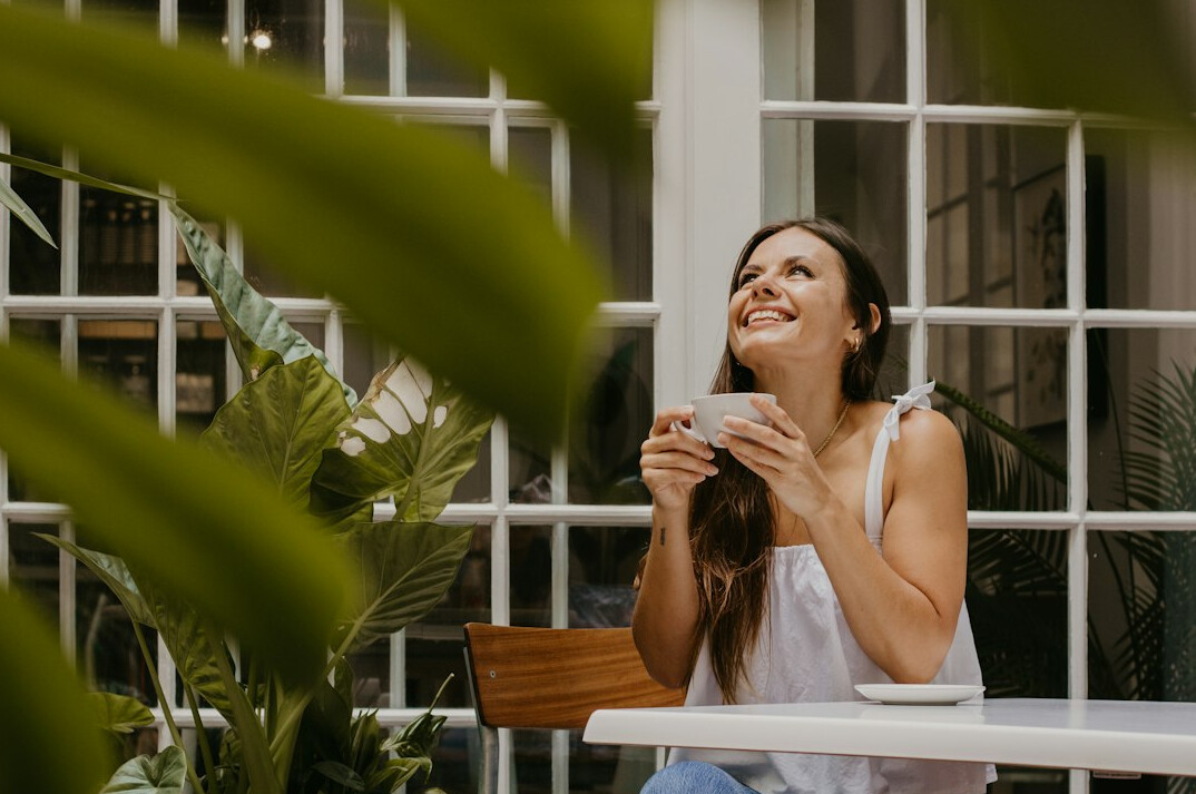 person enjoying morning coffee