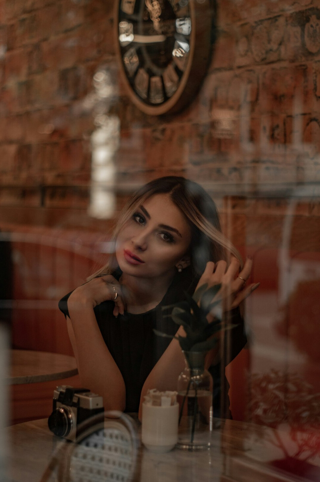Portrait of a smiling Portuguese woman journalist in a blazer