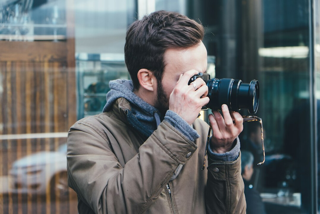 Portrait of a Portuguese man reporter with short hair