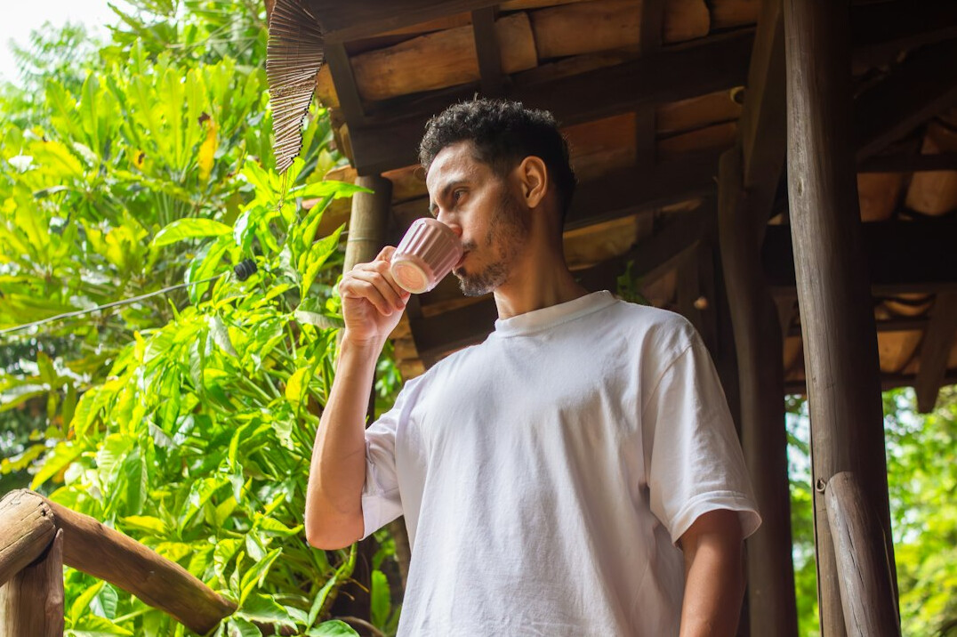 person enjoying morning coffee